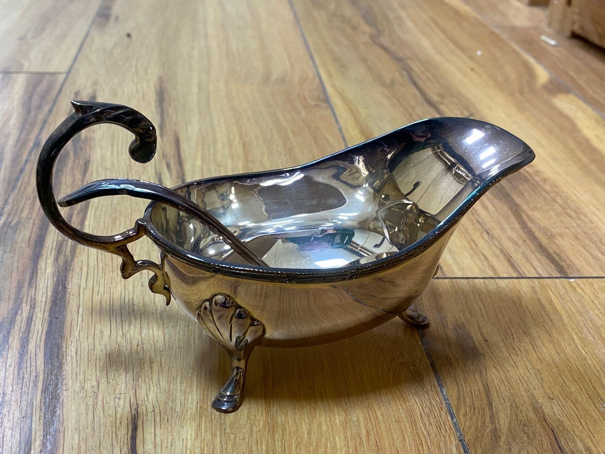 A large Walker & Hall oval plated two handled tea tray, a coaster, a crumb tray and sundry plated wares